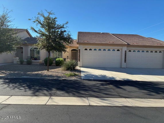 Front view of a single-story house with a double garage.