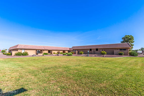 Front view of a single-story building with a tiled roof.