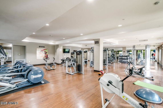 Indoor gym area with various fitness equipment.