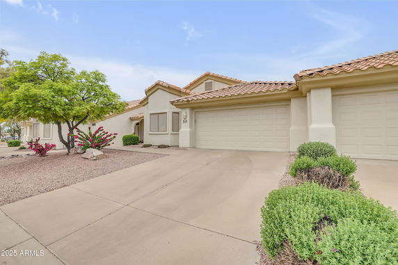 Front view of a single-story house with a double garage.
