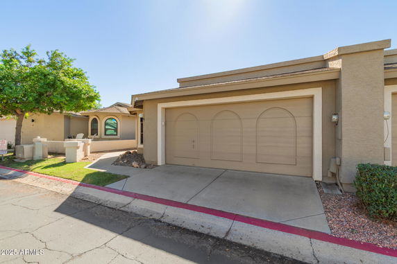 Front view of a house with a double garage.