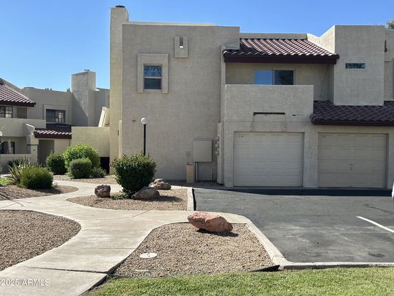 Front view of a house with a double garage.