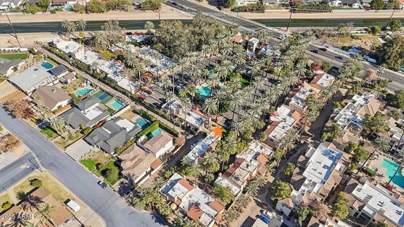 Aerial view of a residential neighborhood with houses and trees.