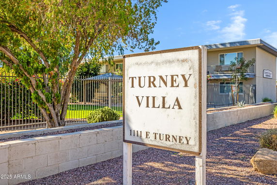 Front view of a building with a sign that reads 'Turney Villa.'