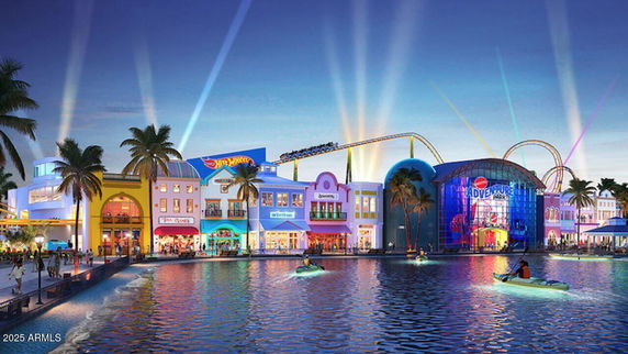 Front view of a colorful amusement park with various themed buildings and a roller coaster.