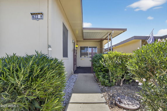 Front view of a single-story house with a covered porch.