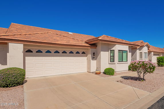 Front view of a single-story house with a double garage.