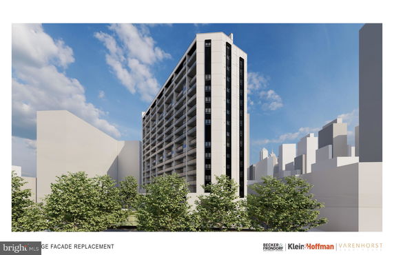 Front view of a multi-story building with a modern facade.