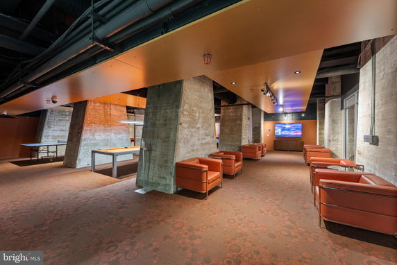 Recreation area with seating and game tables