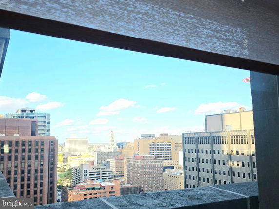 Wide angle view of city buildings from a high vantage point.