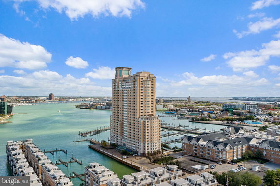 Panoramic view of waterfront buildings and surrounding area.