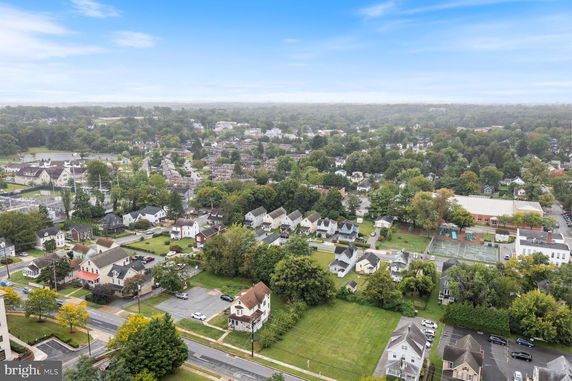 Panoramic aerial view of residential neighborhood and surrounding areas.