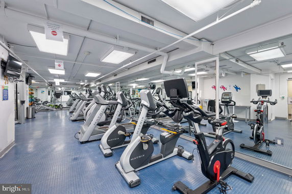 Interior view of a gym with exercise equipment.