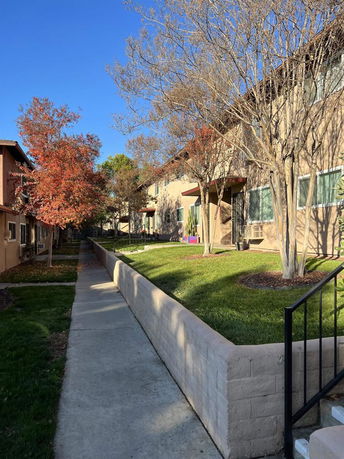 Front view of a multi-story residential building.