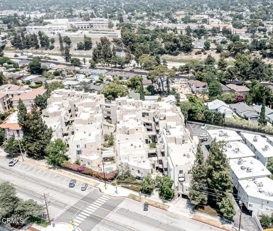 Panoramic aerial view of residential buildings in an urban area.