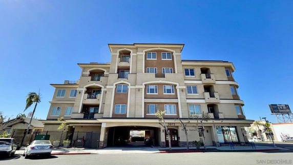 Front view of a multi-story apartment building.
