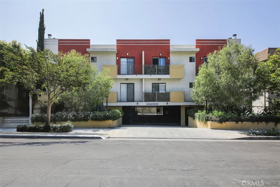Front view of a multi-story building with a modern architectural design.