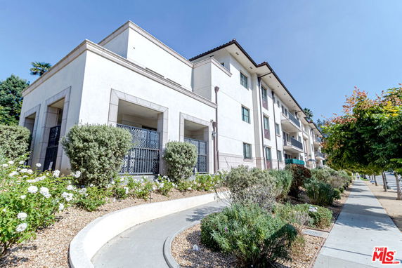 Front view of a multi-story residential building.