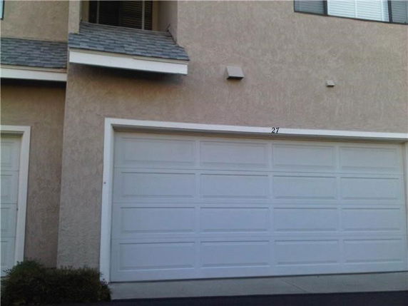 Front view of a house with a two-car garage.
