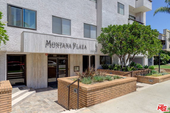 Front view of a multi-story building named Montana Plaza.