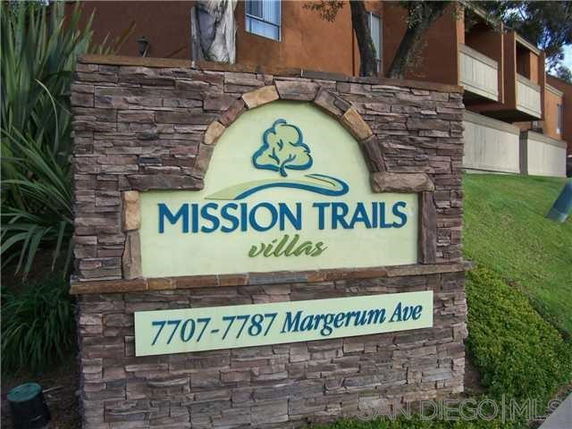 Front view of a sign for Mission Trails Villas.