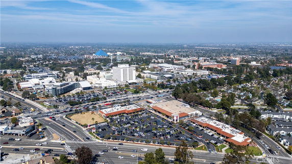 Panoramic view of an urban area with roads and buildings.