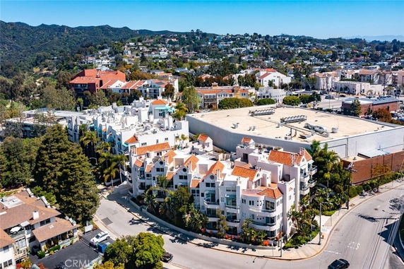 Panoramic view of apartment buildings with surrounding landscape.