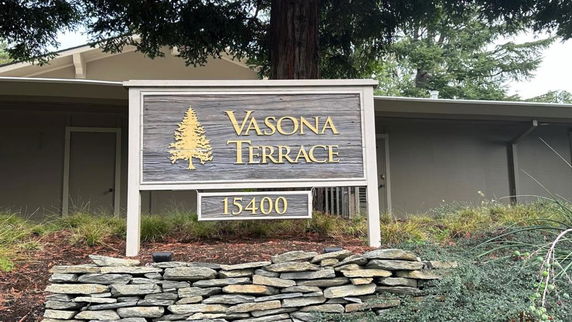 Front view of a building with a sign reading 'Vasona Terrace' and the address '15400'.