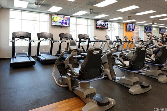 Indoor gym area with treadmills and exercise bikes.