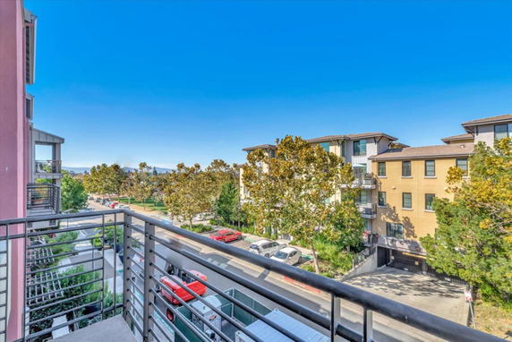 View of surrounding residential buildings from a balcony.