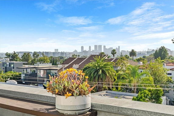 Panoramic view of urban landscape with city skyline in the distance.