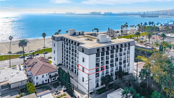 View of a multi-story apartment building near the beach