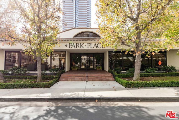 Front view of a building with a sign reading 'Park Place.'