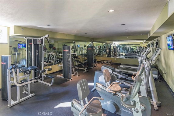 Interior view of a gym with various exercise equipment.