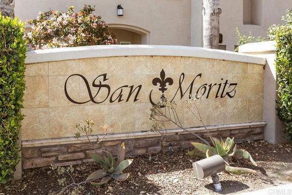 Front view of a building entrance with decorative signage reading 'San Moritz.'