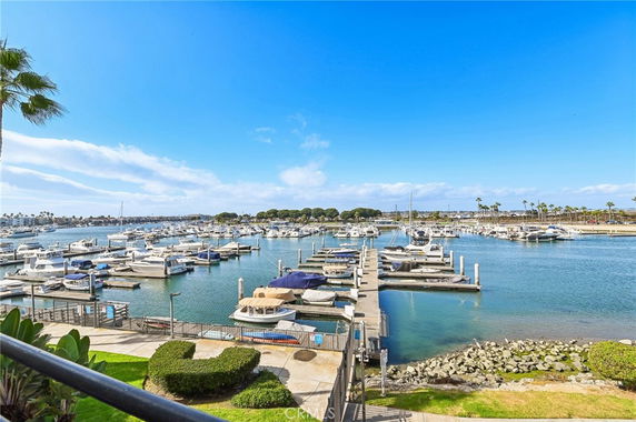 Panoramic view of a marina with boats docked at a harbor.