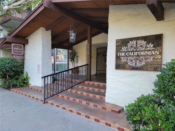 Front entrance of a building with a tiled staircase and decorative signage reading 'The Californian'.