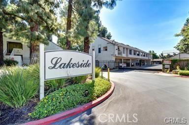 Front view of a residential building with a sign reading 'Lakeside'.