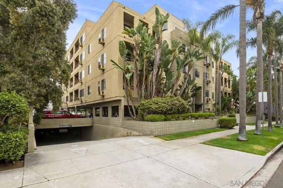 Front view of a multi-story residential building.