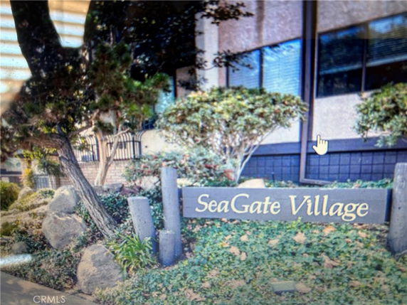 Front view of a building with a sign reading 'SeaGate Village'.
