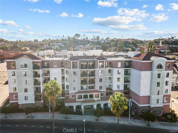 Front view of a multi-story apartment building.