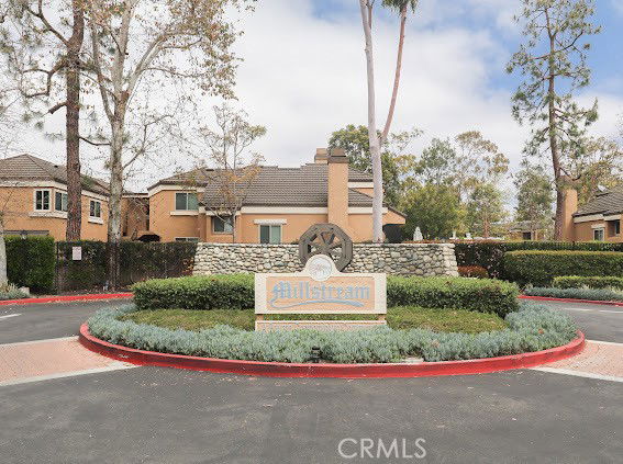 Front view of a residential building with a sign labeled 'Millstream'.