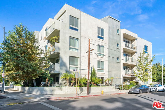 Front view of a multi-story apartment building.