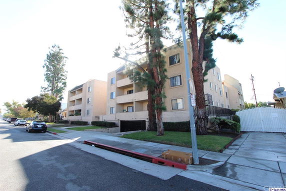Front view of a multi-story residential building.