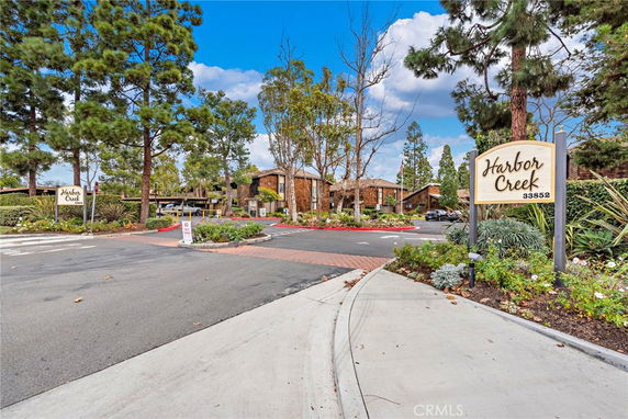 Front view of a complex with signage reading 'Harbor Creek.'