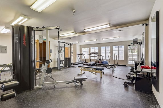 Indoor gym area with exercise equipment and bright lighting