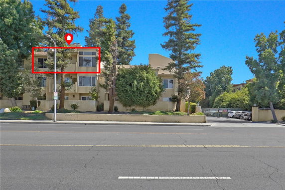 Front view of a multi-story residential building.