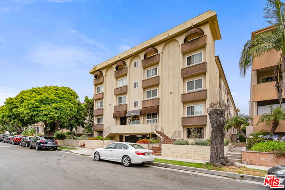Front view of a multi-story residential building.