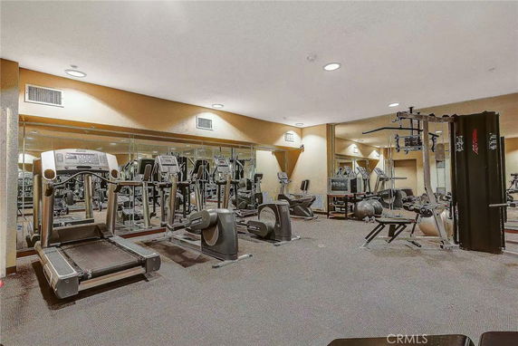 Indoor gym area with treadmills and exercise equipment.