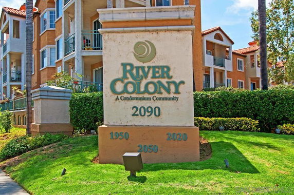 Front view of a multi-story condominium building.